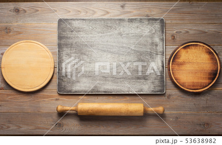 cutting board at wooden plank table 53638982