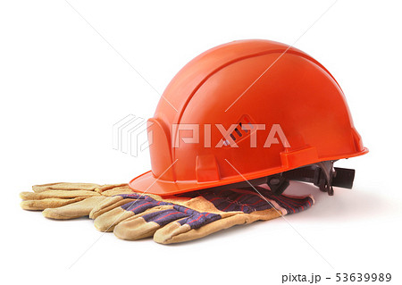 Orange hard hat, safety gloves on white background. Safety helmet. Orange hard hat, safety gloves on white background. Safety helmet. 53639989