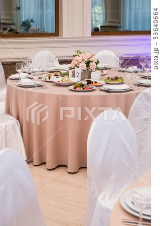 Served for banquet restaurant table with dishes 53640664