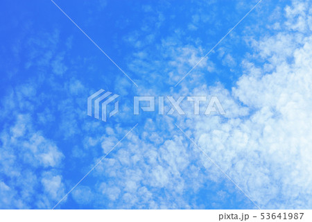 Beautiful light blue sky with white clouds Beautiful light blue sky with white clouds 53641987