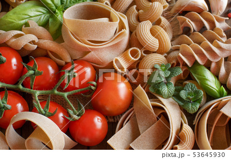 Whole wheat pasta with vegetables and  herbs 53645930