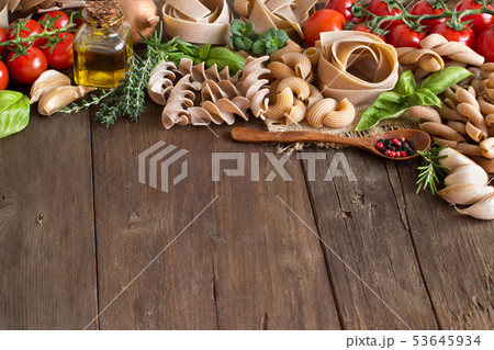 Whole wheat pasta, vegetables,  herbs and olive 53645934