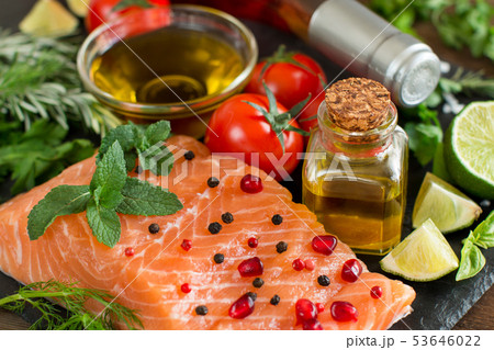 Salmon with vegetables, olive oil and herbs 53646022