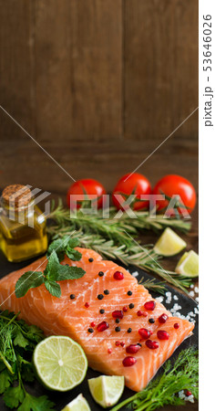 Salmon with vegetables, olive oil and herbs Salmon with vegetables, olive oil and herbs 53646026