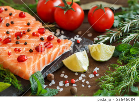 Salmon with vegetables and herbs 53646084