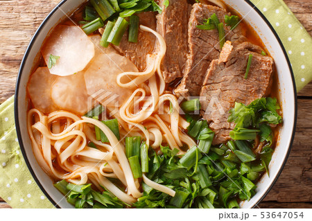 Asian soup made of stewed or braised beef, broth, 53647054