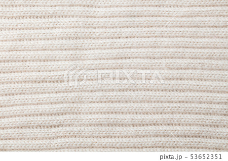 White, beige knitted wool texture background pattern with high resolution. Top view. Copy space. 53652351