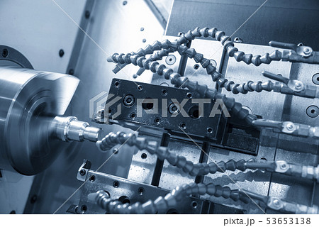 The CNC lathe machine cutting the thread . The CNC lathe machine cutting the thread . 53653138