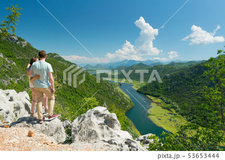 couple enjoying the view of the Crnojevica River 53653444