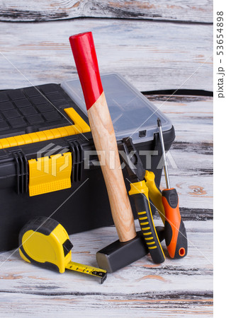 Tool kit on wooden background. 53654898