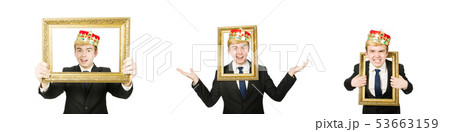 Man with picture frame isolated on the white 53663159