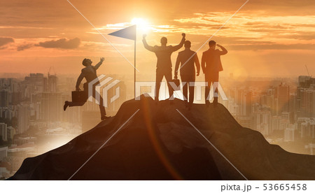 Businessmen in achievement and teamwork concept Businessmen in achievement and teamwork concept 53665458
