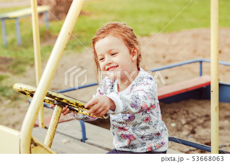 the child plays on the Playground 53668063
