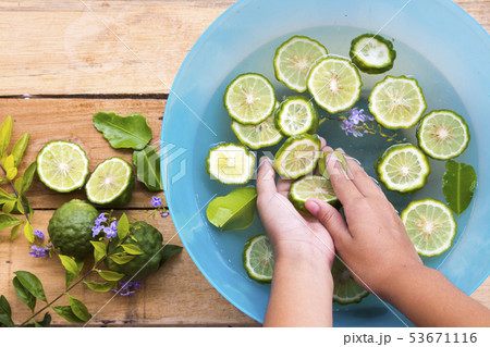 hand of girl cleaning with kaffir float on water  53671116