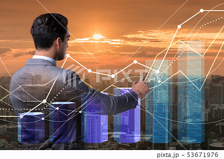 Businessman in stock trading concept Businessman in stock trading concept 53671976