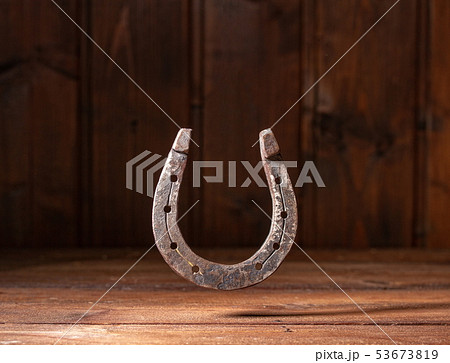 Horseshoe Wooden Background 53673819