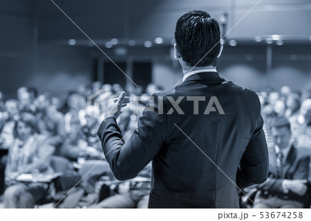 Public speaker giving talk at business event. Public speaker giving talk at business event. 53674258