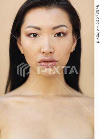 Beautiful asian model with long dark hair Beautiful asian model with long dark hair 53678846
