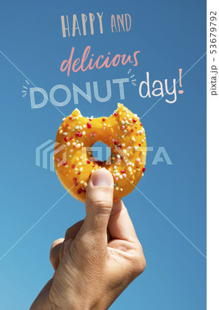donut and text happy and delicious donut day 53679792