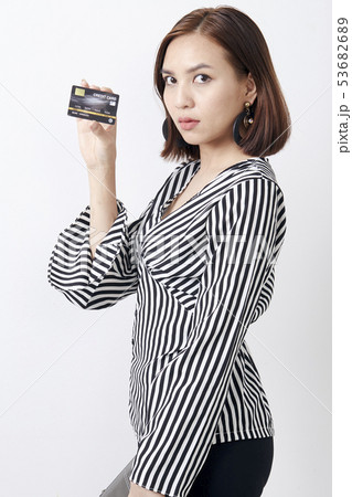 Asian woman holding card Asian woman holding card 53682689