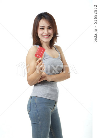 Young smiling  asian woman presenting credit card 53682852