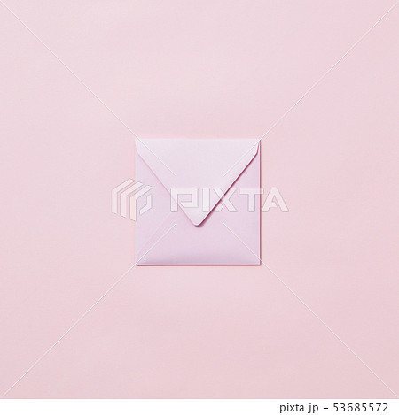 Handcraft envelope mockup for post card on a pastel pink background. Handcraft envelope mockup for post card on a pastel pink background. 53685572