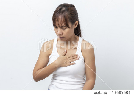 asian young woman having severe chest pain 53685601