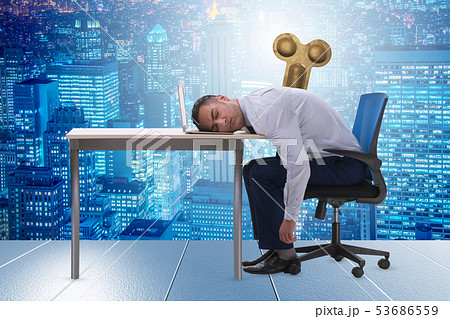 Employee losing energy from too much work Employee losing energy from too much work 53686559