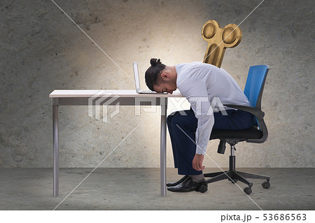Employee losing energy from too much work Employee losing energy from too much work 53686563