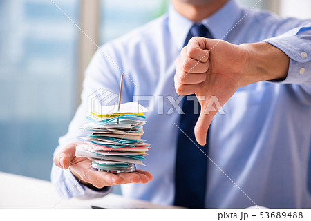 Young male employee in budget planning concept Young male employee in budget planning concept 53689488