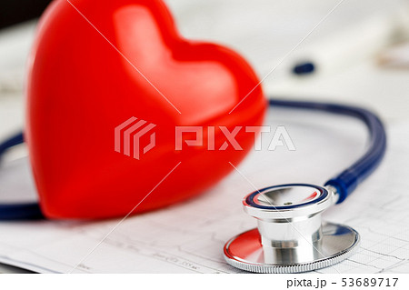 Medical stethoscope head and red toy heart Medical stethoscope head and red toy heart 53689717