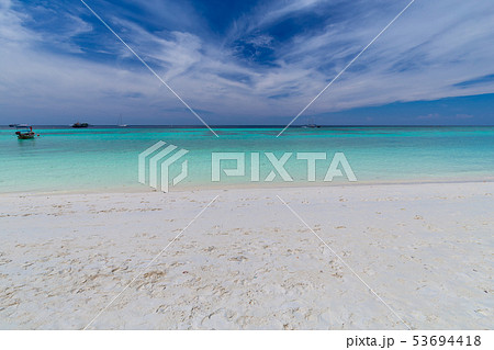 Clear water and blue sky at the paradise island Clear water and blue sky at the paradise island 53694418