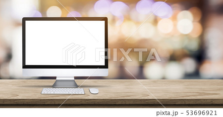 Blank screen desktop computer on wooden table top Blank screen desktop computer on wooden table top 53696921