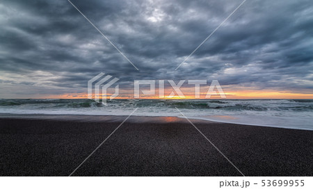 A Dramatic Sunset at the Beach, Color Image 53699955