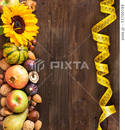 Autumn border on a wooden table 53700788