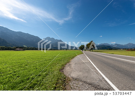 Countryside landscape and Alps - Schwangau Germany Countryside landscape and Alps - Schwangau Germany 53703447