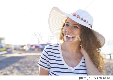 Girl on the beach Girl on the beach 53703848