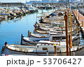 Sailing, motor boats moored seawall. Blanes, Spain 53706427