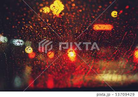 Drops Of Rain Drizzle on the glass windshield Drops Of Rain Drizzle on the glass windshield 53709429