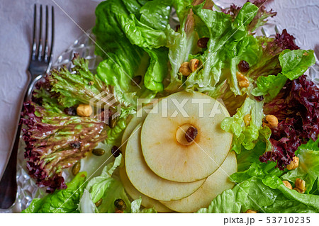 Green salad with apple fruit in Spanish restaurant Green salad with apple fruit in Spanish restaurant 53710235