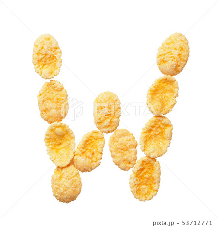Yellow cornflakes letter W isolated on white background. Alphabet cereal flakes. Yellow cornflakes letter W isolated on white background. Alphabet cereal flakes. 53712771