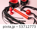 Set of erotic toys for BDSM. The game of sexual slavery with handcuffs, whip, gag and leather straps 53712773