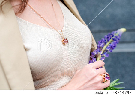 People, fashion, jewelry and luxury concept, closeup of woman wearing luxury jewelry standing on the People, fashion, jewelry and luxury concept, closeup of woman wearing luxury jewelry standing on the 53714797