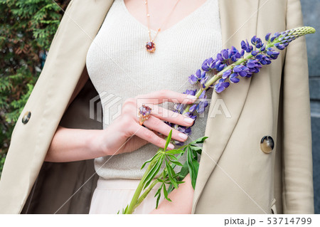 People, fashion, jewelry and luxury concept, closeup of woman wearing luxury jewelry standing on the 53714799
