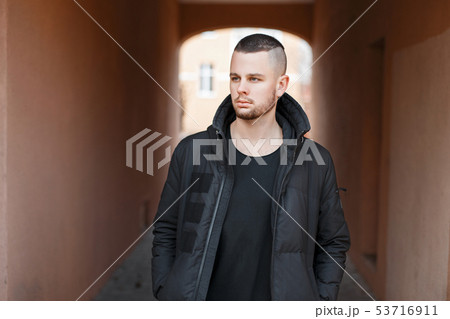 Handsome fashionable man in black stylish jacket 53716911