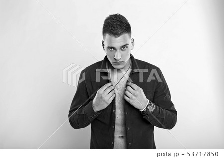 Black and white photo of a young handsome man Black and white photo of a young handsome man 53717850