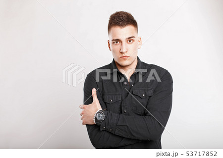 Portrait of a handsome man in a black shirt 53717852