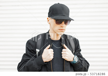 Handsome stylish man in sunglasses Handsome stylish man in sunglasses 53718286