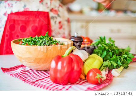 Fresh seasonal vegetables on kitchen table ready for cooking 53718442