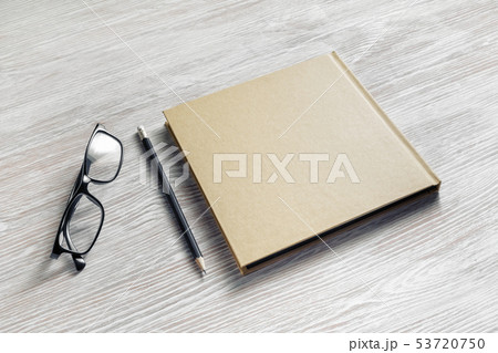 Notebook, glasses, pencil 53720750